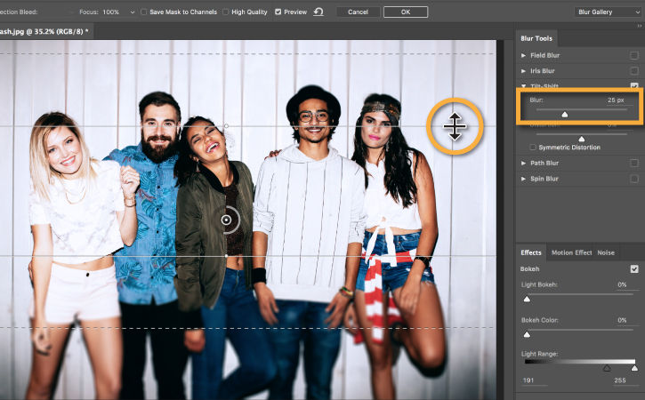 Horizontal dashed and solid lines show where image will be blurred. Sliders in the Blur Tools menu adjust intensity of blur.