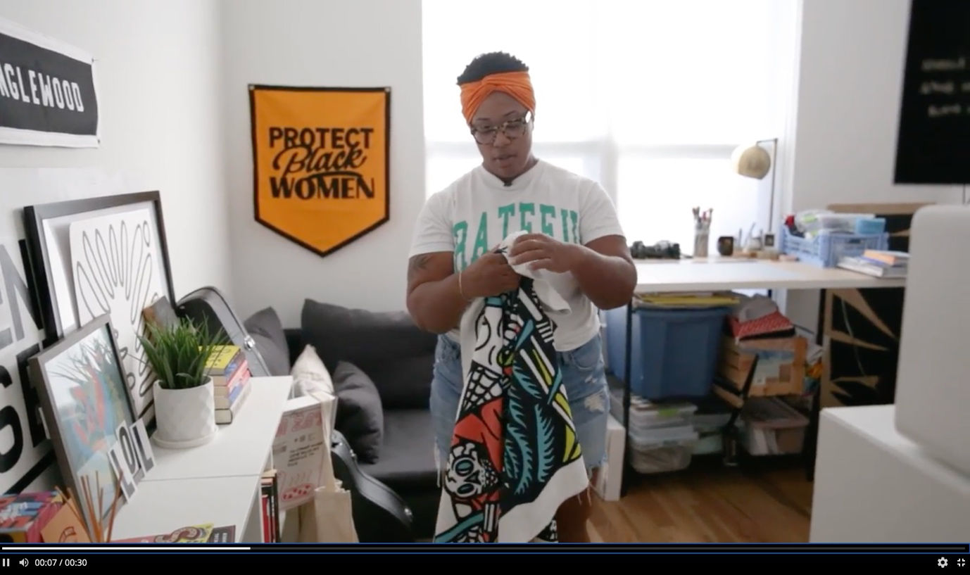 A person holding a towelDescription automatically generated