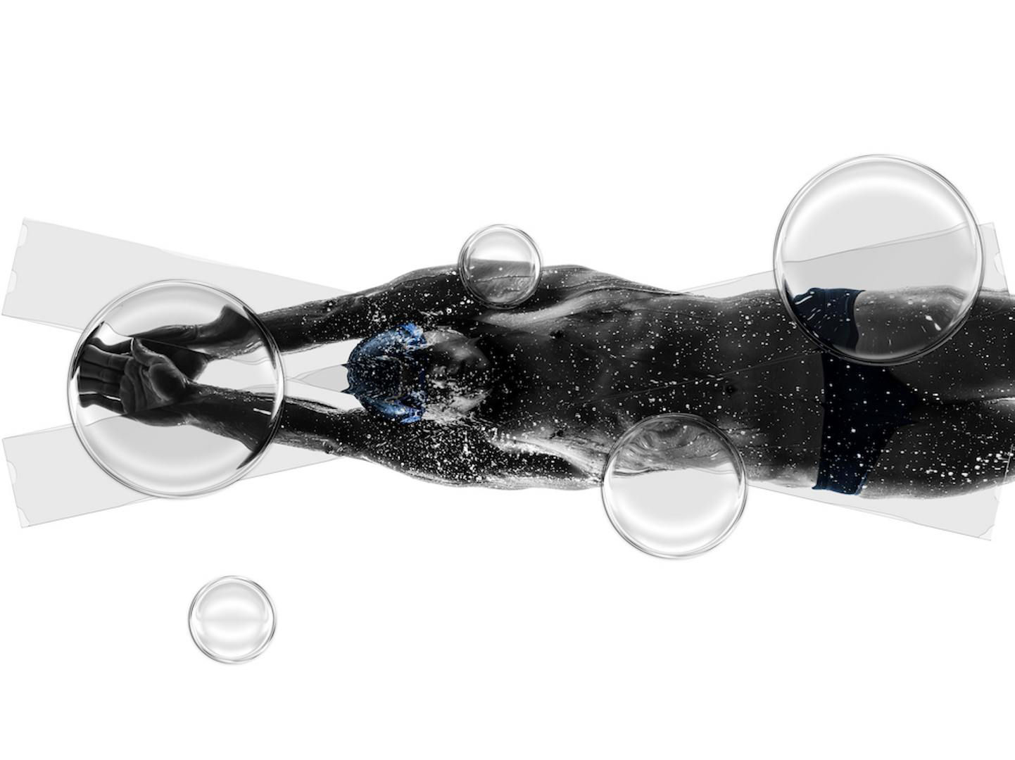 A person swimming in waterDescription automatically generated