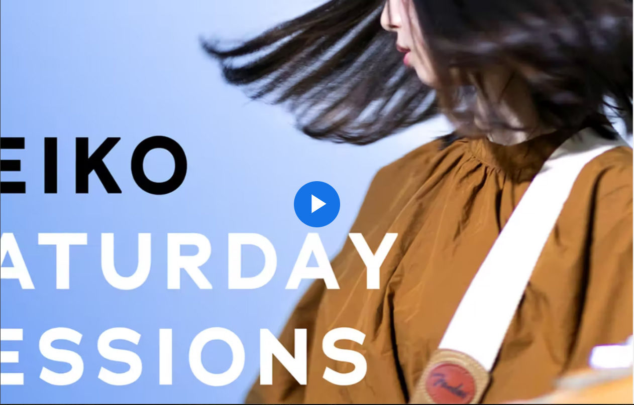 A person with her hair blowing in the windDescription automatically generated