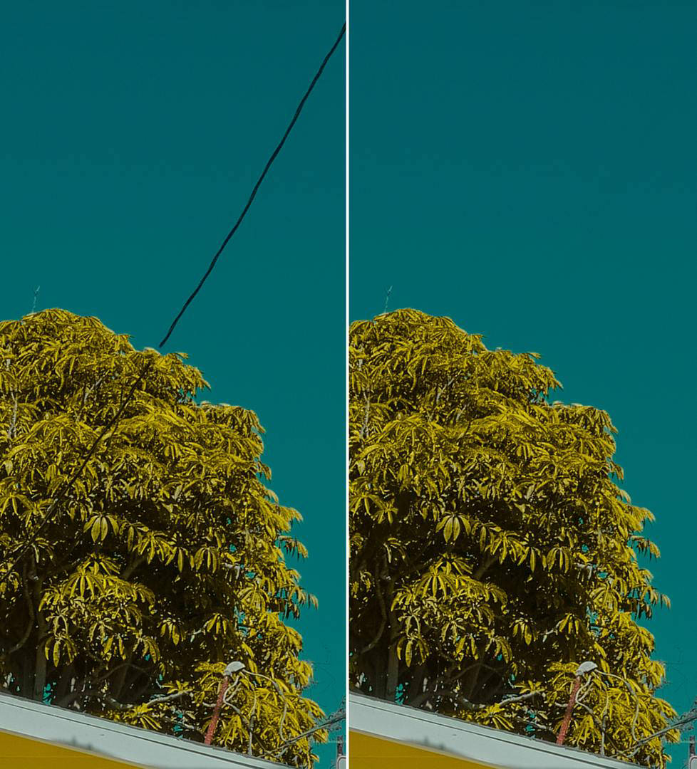 A power lines obstructs the view of a clear blue-green sky, and cuts across a tree. The slider introduces an 'after' image in which the power line is removed.