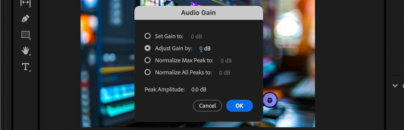 Audio Gain dialog box in Adobe Premiere Pro showing options to set gain, adjust gain by a value, normalize max peak, and normalize all peaks, with Peak Amplitude displayed at 0.0 dB.
