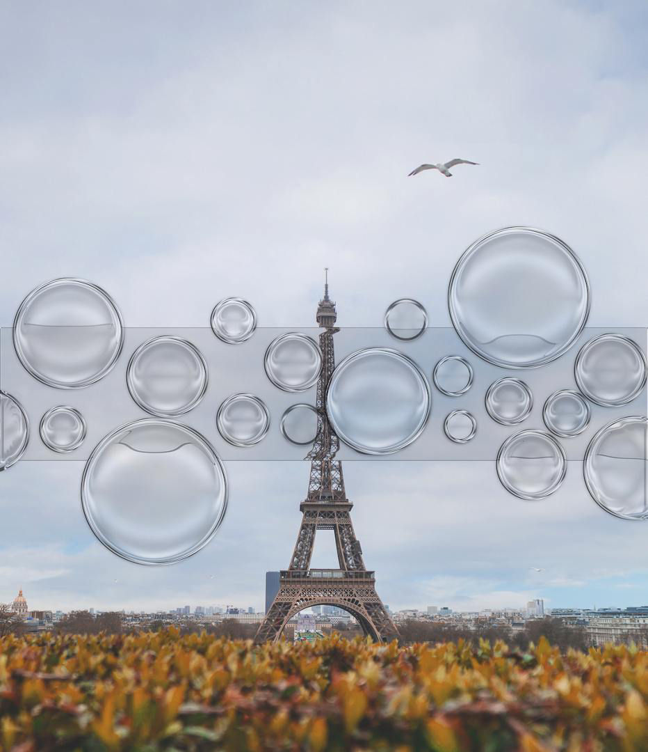 A tower with a view of the eiffel towerDescription automatically generated