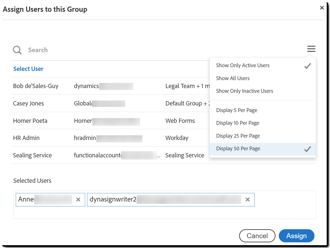 The Assign Users to this Group overlay with the pagination menu exposed.