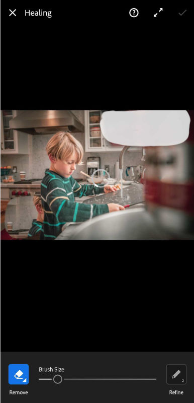 Paggamit ng Heal tool upang alisin ang mga hindi gustong bagay mula sa larawan