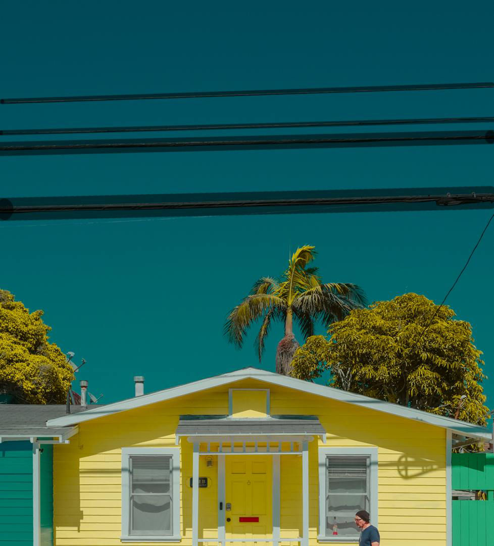 Four power lines are painted out with the Spot Healing Brush.