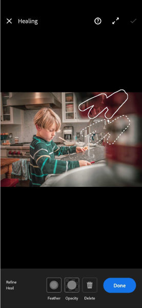 Paggamit ng Heal tool upang alisin ang mga hindi gustong bagay mula sa larawan