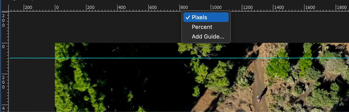 The Program Monitor displays measurement options, including Pixels, Percent, and Add Guide.