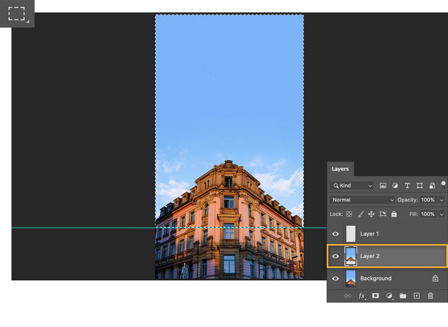 The building displays on the canvas with rulers on the top and bottom and a blue guide in the middle.