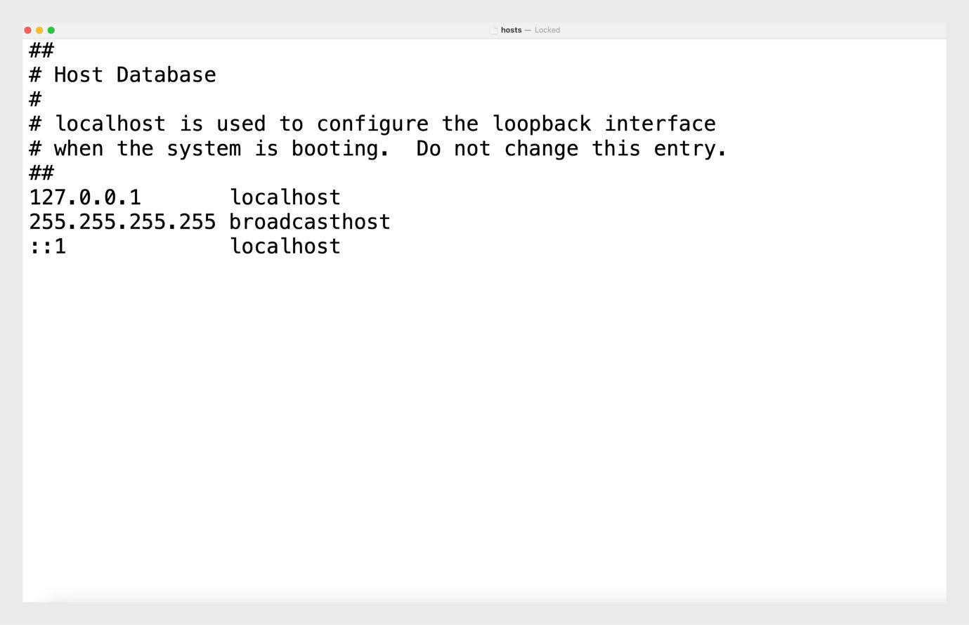 The hosts file showing only localhost information after you have removed all Adobe-related entries.