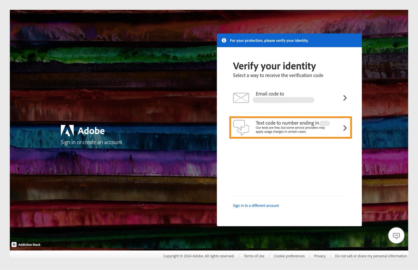 Verify your identity window with the Text code to number option highlighted, to send a code to your registered phone number.