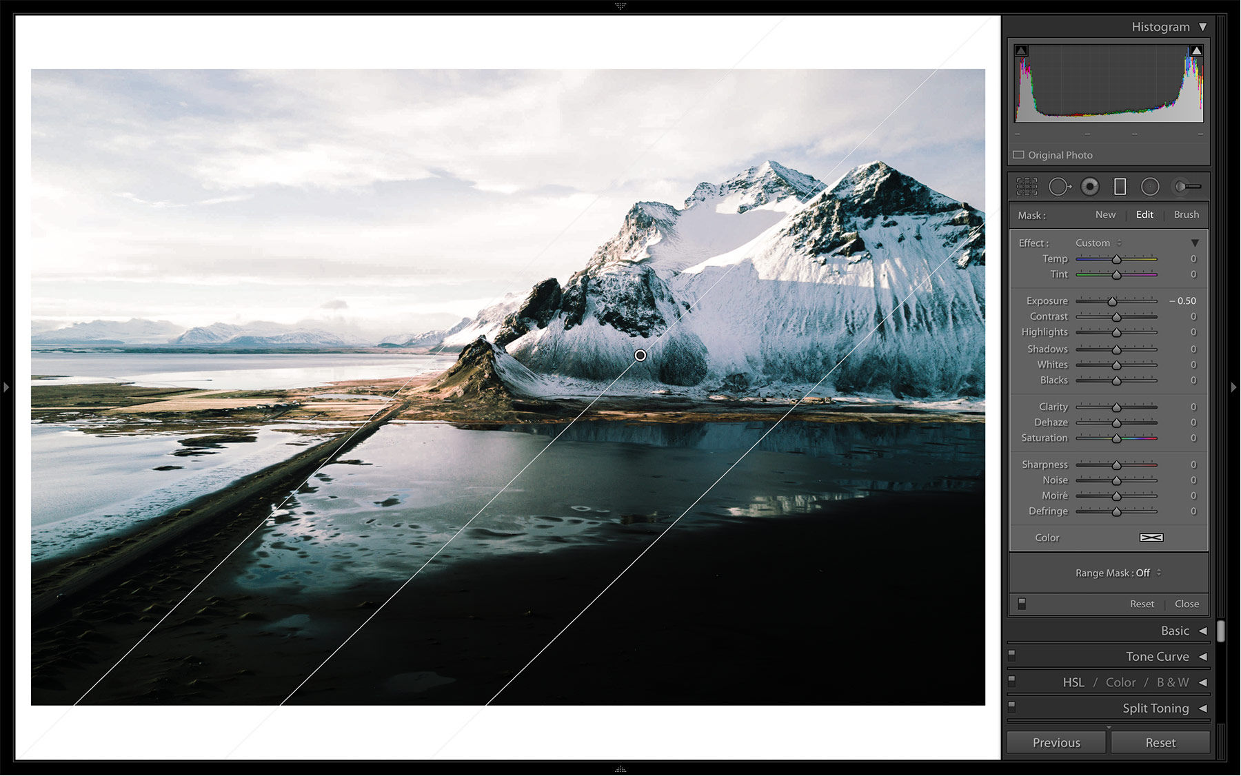 A Graduated Filter is applied to decrease exposure on the mountains and reduce highlights in the sky.