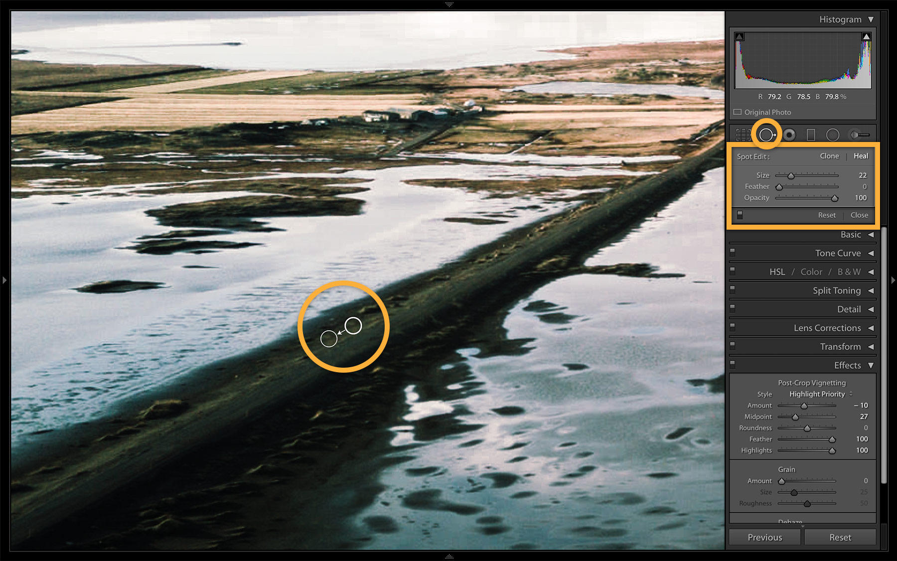 The spot removal brush is used to remove marks caused by dust or scratches on the camera lens.