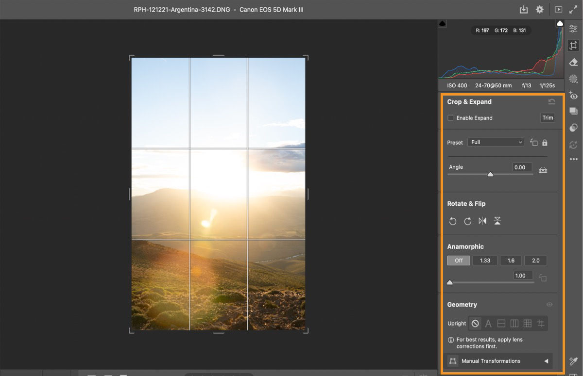 Photo of a sunset is open in Adobe Camera Raw. Adjust the size and perspective with Crop tools. 