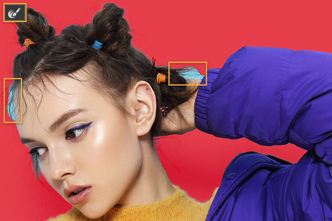 Closeup shot of model with red overlay on background, orange callouts around remaining blue background areas