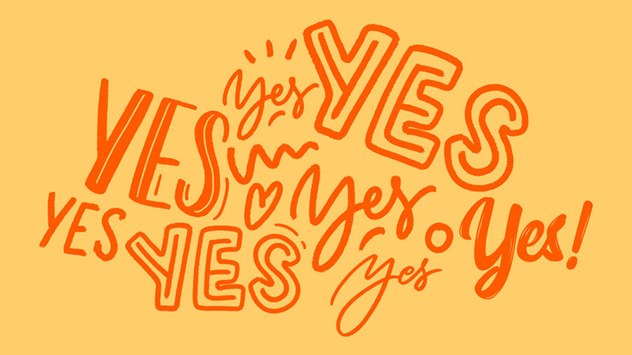 The word YES is shown is many different styles in orange on a yellow background