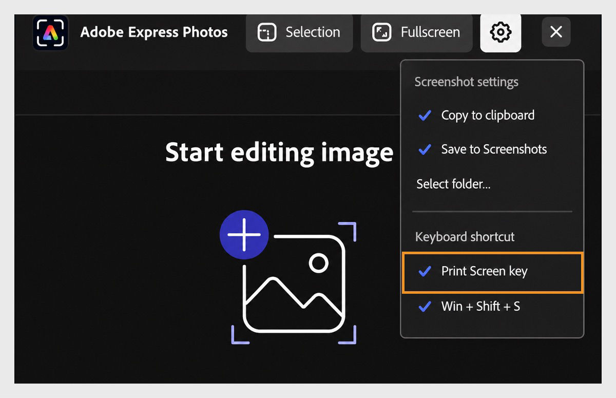 Adobe Express Photos screenshot toolbar displayed at the top of the screen in dark mode. The toolbar includes options such as Selection, Fullscreen, and a Settings button. The Settings menu is expanded, showing screenshot settings and keyboard shortcut options. The “Print Screen key” option is selected under the Keyboard shortcut section, indicating that screenshots can be captured using the PrtSc key.
