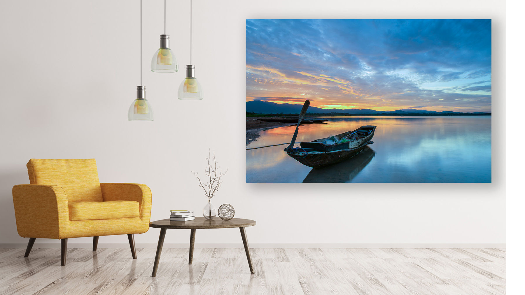 Sitting area with small table, chair, and pendant lights features artwork of rowboat on a lake at night with colorful sunset