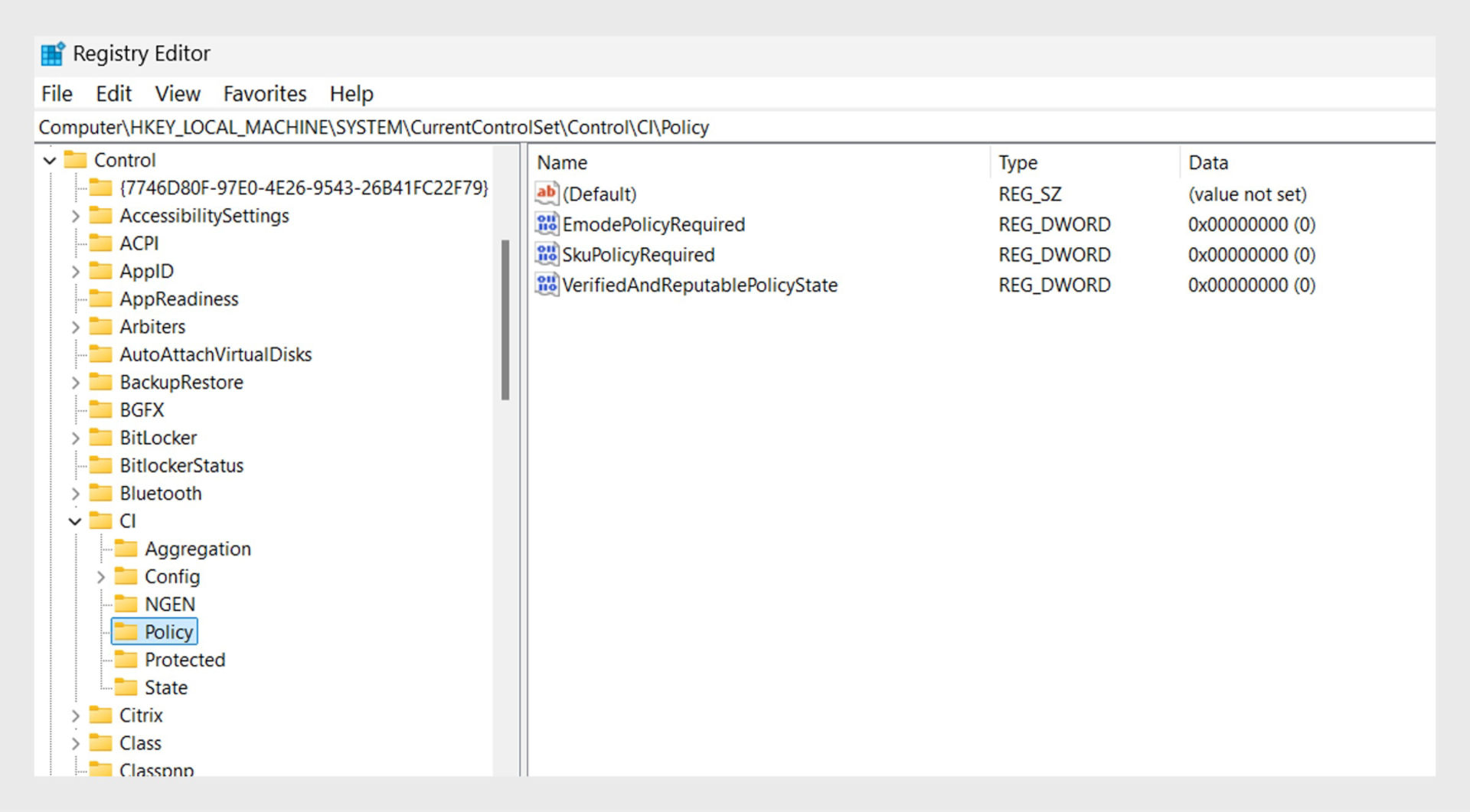 Windows Registry Editor open to HKLM\SYSTEM\CurrentControlSet\Control\CI\Policy, showing registry values.
