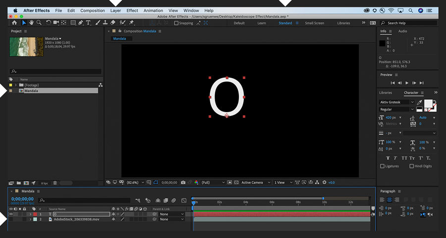 White letter “O” is added to a new black text layer above a video layer.