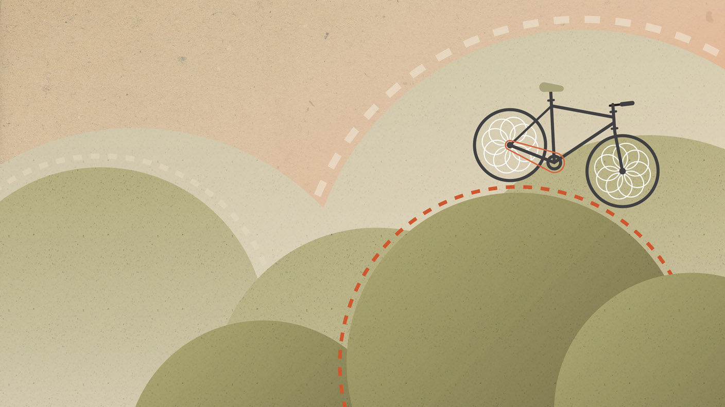 Cartoon bicycle riding over circle-shaped hills 