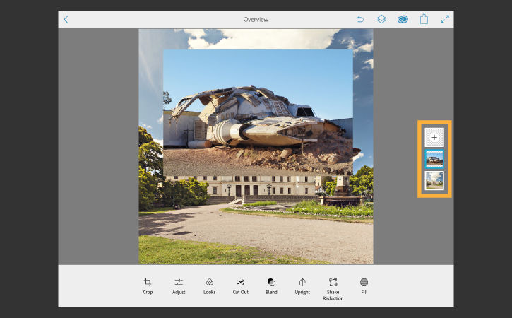 A spaceship photo is placed on top of the campus building and appears in a new layer 