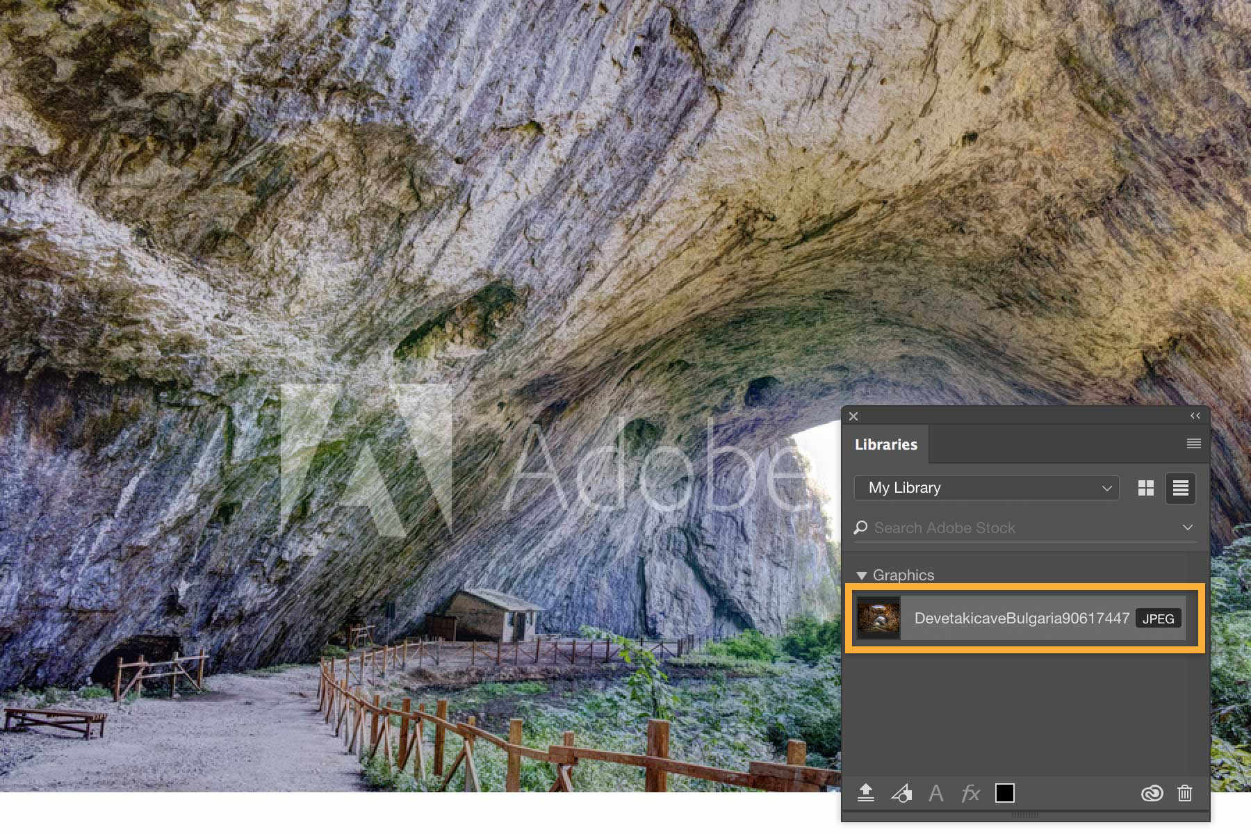 The Adobe watermark is displayed on a photo of a large cave with wooden railing. The Libraries panel shows graphics in use. 