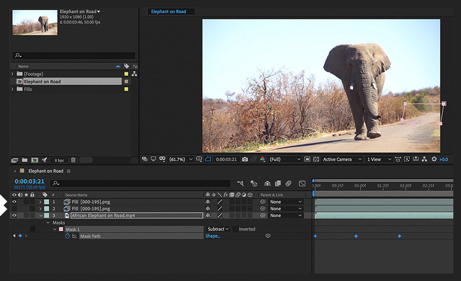 Cars are removed from the video of the elephant walking along the road.