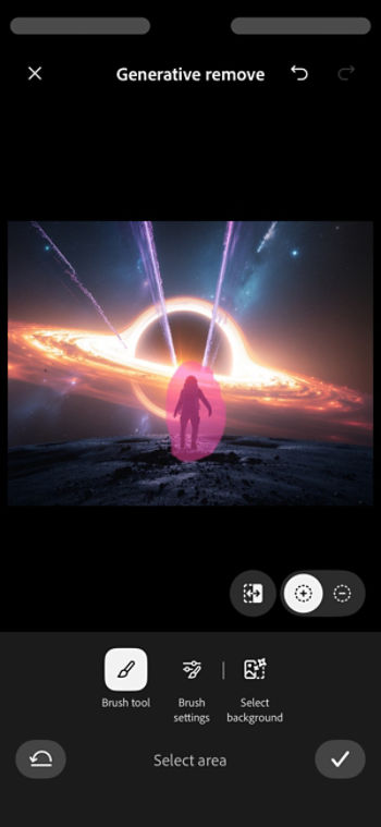 The image shows a Zen garden with sand, a tree and a shrub and a pile of brown smooth stones. Using the brush tool an empty space is created to add new elements.