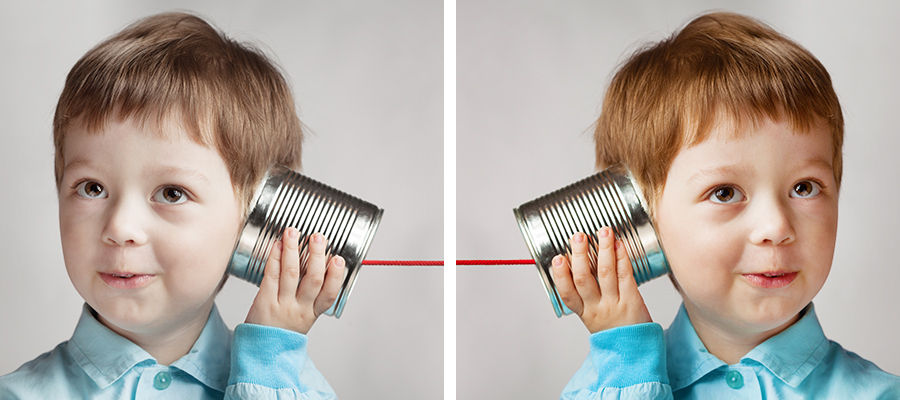 Side by side photos of a boy with a toy can phone, the right side image has been warmed up by removing a bluish tint