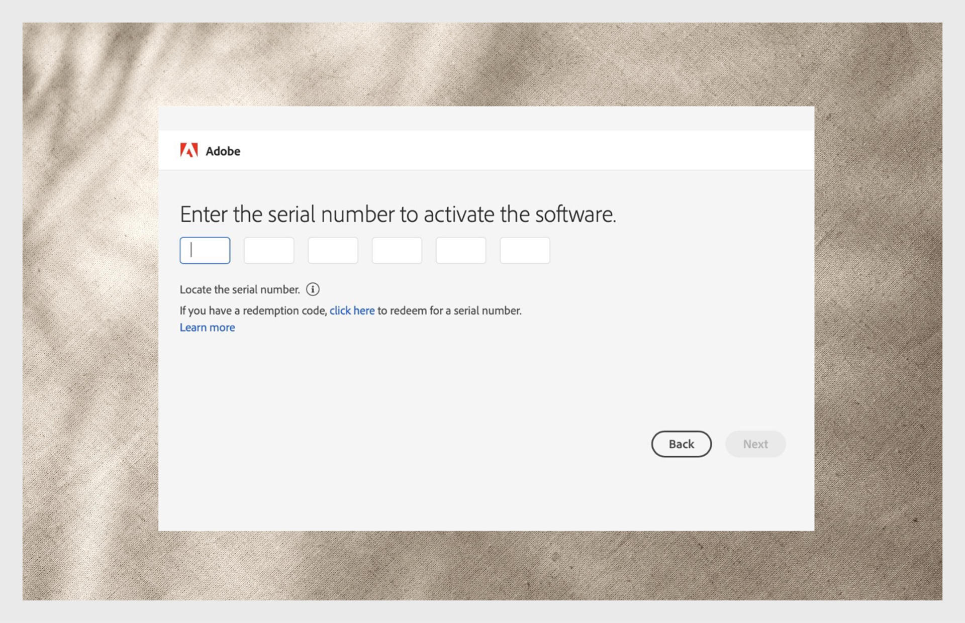 Adobe activation screen prompting the user to enter a serial number.