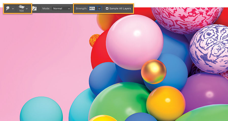 Smudge tool settings displayed in Options bar at the top of the colorful image with the spheres