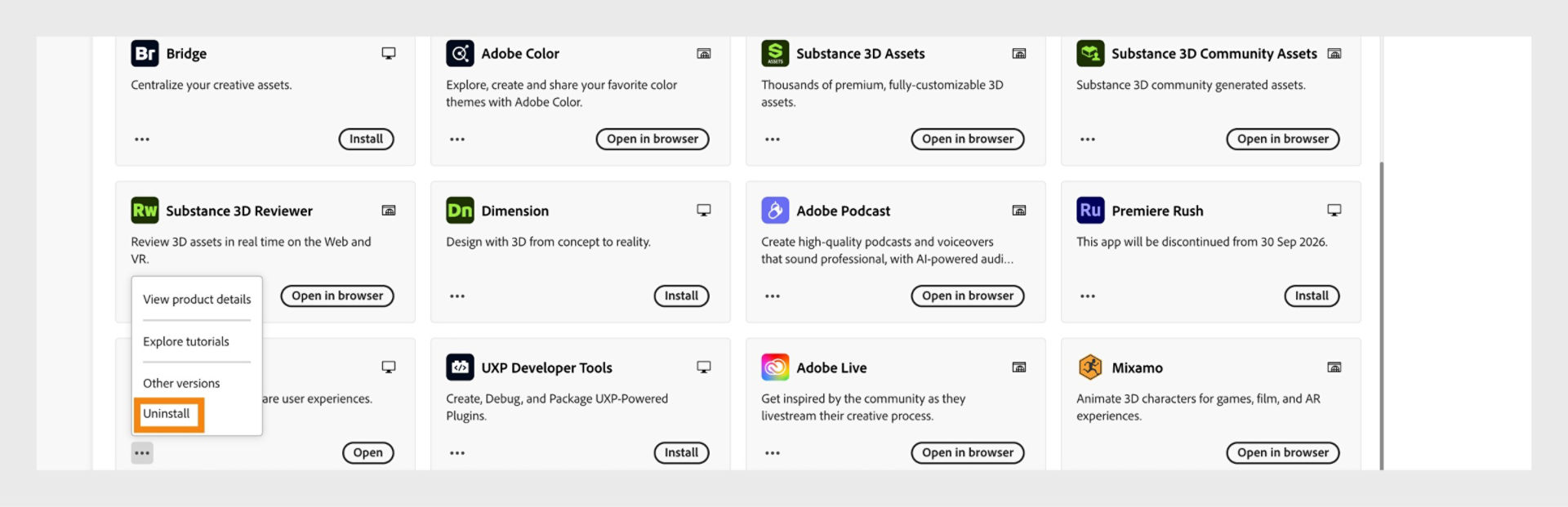 The context menu for a Creative Cloud app includes options to open in the browser and uninstall.