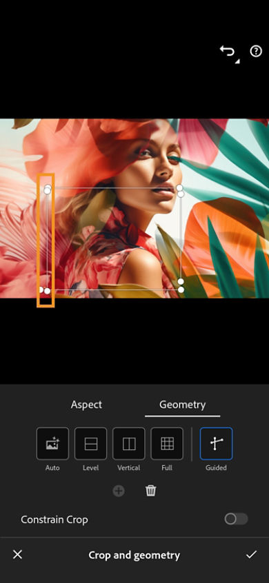 lady edited images where upright guide lines are displayd and one of them is highlighted over a geometry tool of crop feature.