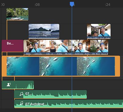 Visuele indicatoren die clips tonen die zijn gekoppeld aan een geselecteerde clip in de V1-hoofdtrack