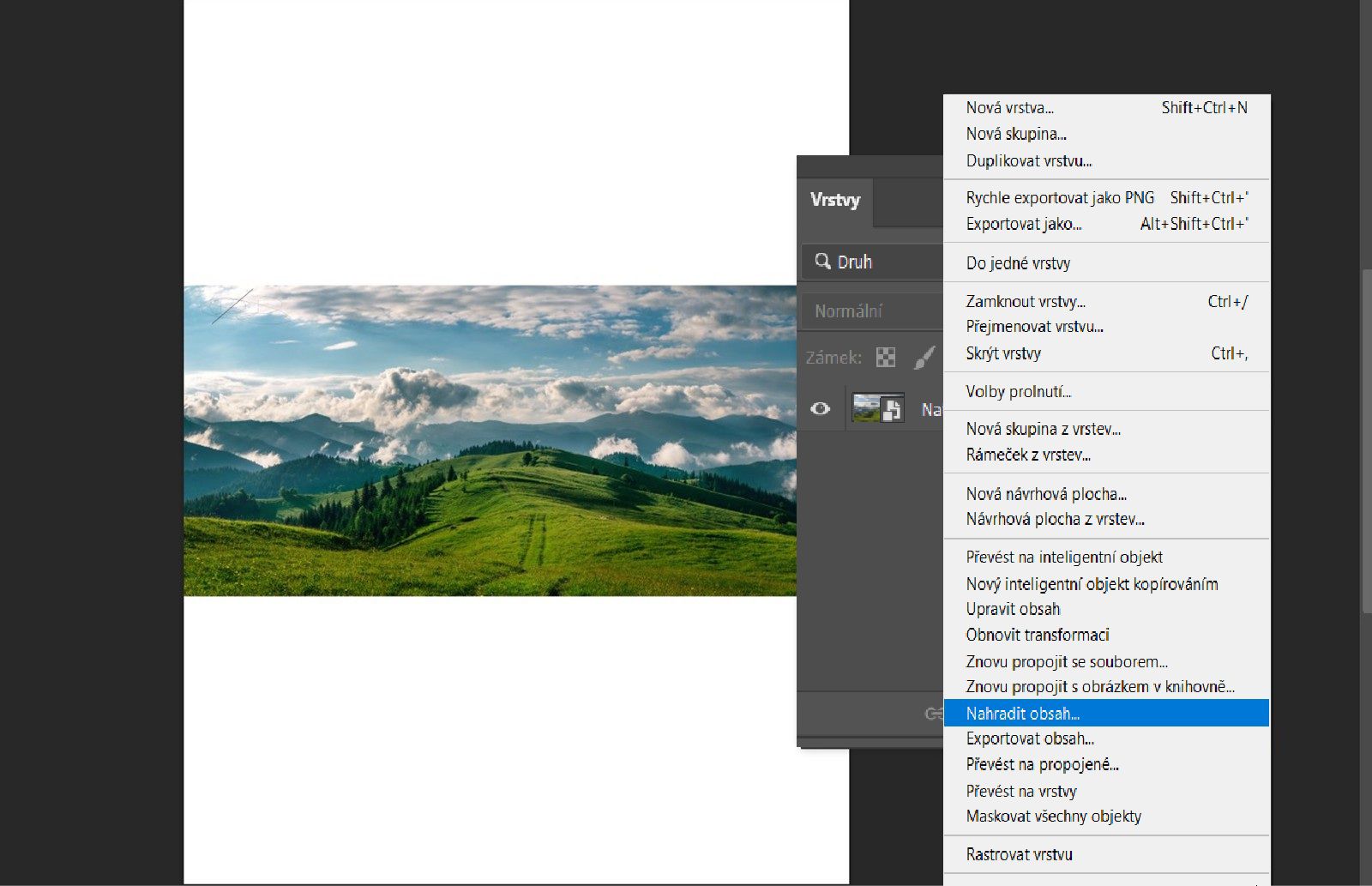 V panelu Vrstvy je vybrána vrstva Chytrého objektu.Možnost Nahradit obsah je zvýrazněna v připojené kontextové nabídce.