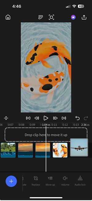 A clip being dragged upward from the main timeline toward the overlay, with a rectangle prompting “Drop clip here to move it up.”