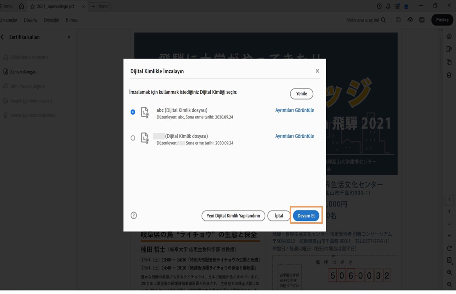 Acrobat'ta imzalama için mevcut dijital kimlikleri gösteren bir iletişim kutusu.Bir dijital kimlik seçilidir ve &quot;Devam&quot; düğmesi vurgulanır.