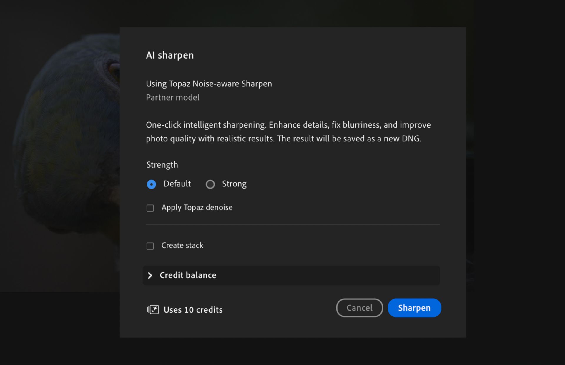 AI Sharpen dialog in Adobe Lightroom showing sharpening options, including Strength settings (Default and Strong), Apply Topaz Denoise, Create Stack, credit usage, and the Sharpen button.
