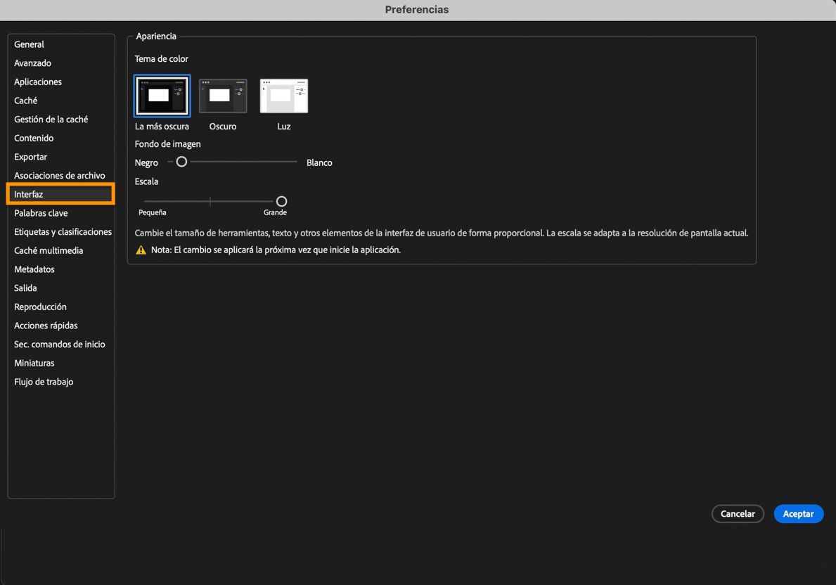 Se muestra el cuadro de diálogo Preferencias de interfaz con opciones para elegir tema de color, fondo de imagen y más.