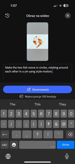 Ekran „Obraz na wideo” z wprowadzonym poleceniem tekstowym: „Spraw, aby dwie ryby poruszały się po okręgu, obracając się wokół siebie w stylu yin-yang”.