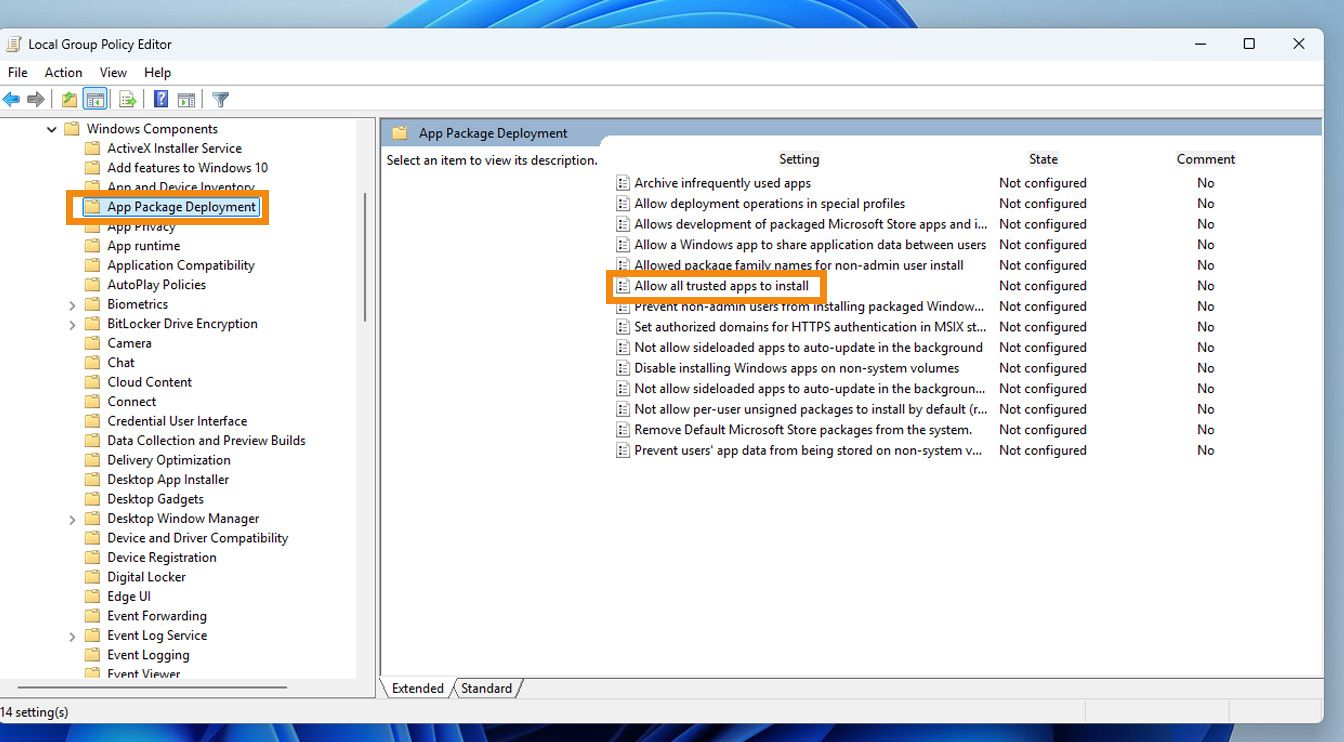 Jendela Local Group Policy Editor menampilkan opsi App Package Deployment di panel kiri dan opsi Allow all trusted apps to install di sebelah kanan