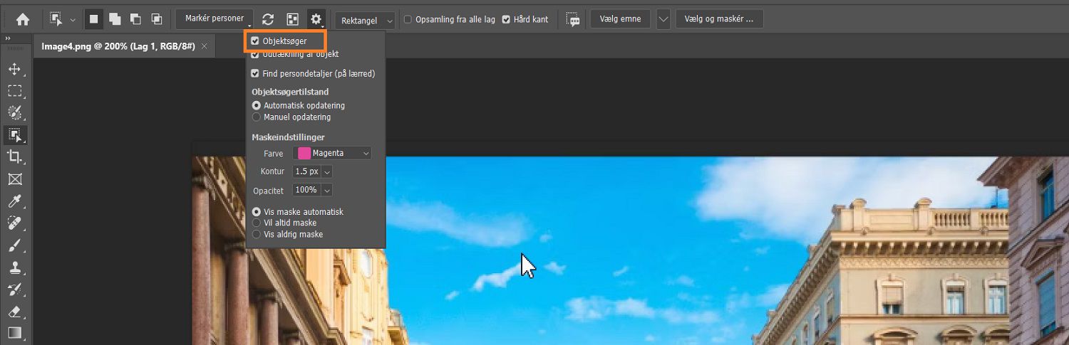 Objektfinder er fremhævet i indstillingsmenuen for objektmarkeringsværktøjet på indstillingslinjen over et billede af bygninger på Photoshop-lærredet.