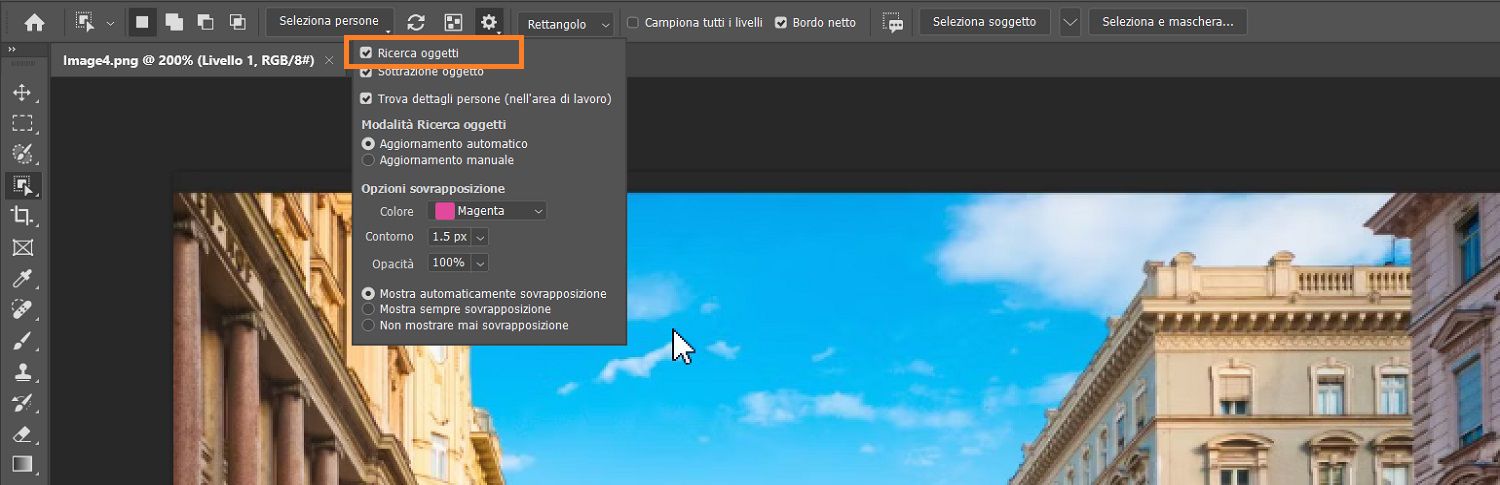 Il rilevatore di oggetti è evidenziato nel menu Impostazioni dello Strumento selezione oggetto nella barra options, sopra un'immagine di edifici nell'area di lavoro di photoshop.