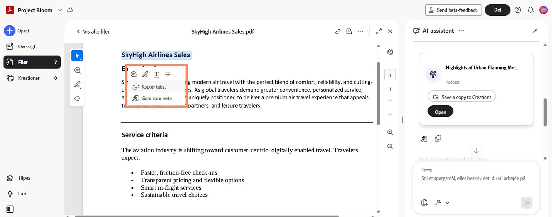 PDF Space viser et åbent dokument med markeret tekst og en kontekstuel menu sammen med et panel med AI-assistenten til at generere idéer og svar.