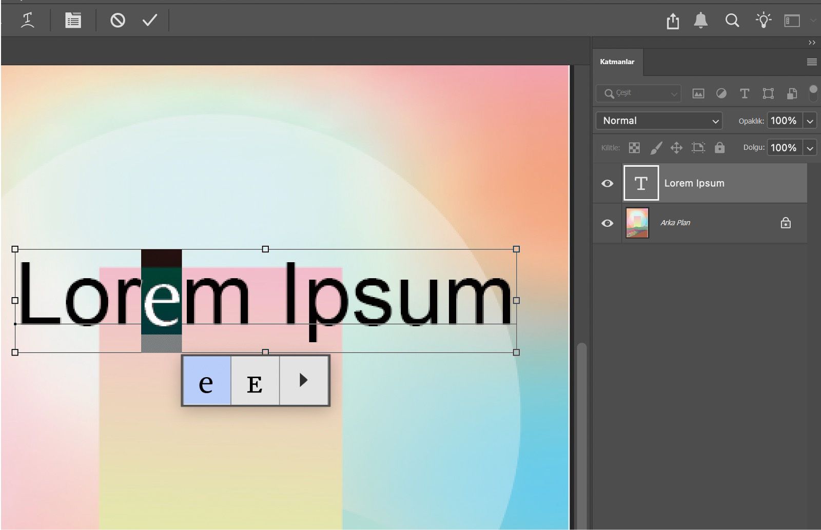 Alternatif glif ızgarasının gösterildiği seçili karakter içeren metin. Katmanlar panelinde etkin metin katmanı görüntüleniyor.