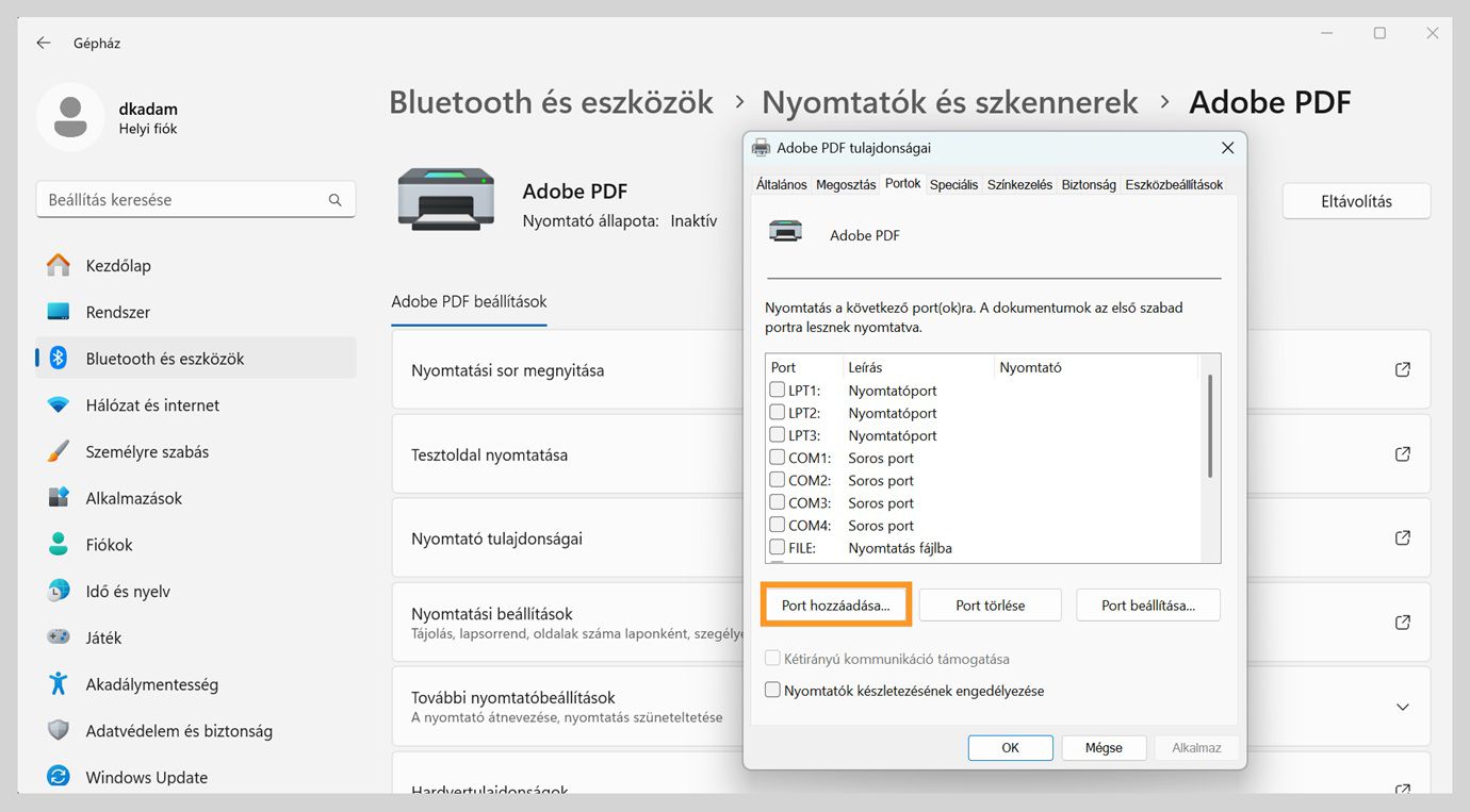 Az Adobe PDF tulajdonságai párbeszédpanel a Portok lapot mutatja megnyitva, a Port hozzáadása, Port törlése és Portok konfigurálása lehetőségekkel.
