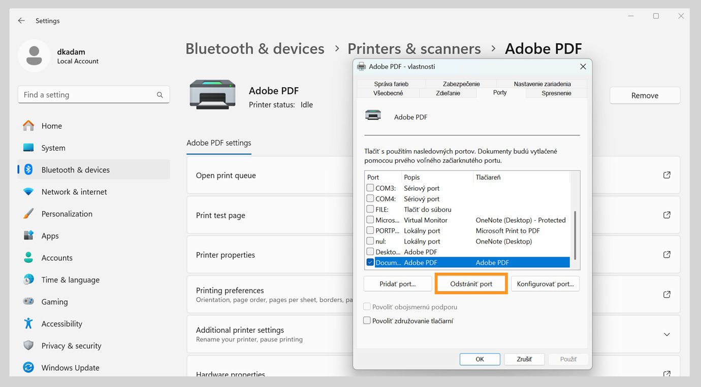 Dialógové okno Vlastnosti tlačiarne Adobe PDF zobrazuje otvorenú kartu Porty s možnosťami Pridať port, Odstrániť port a Konfigurovať porty.
