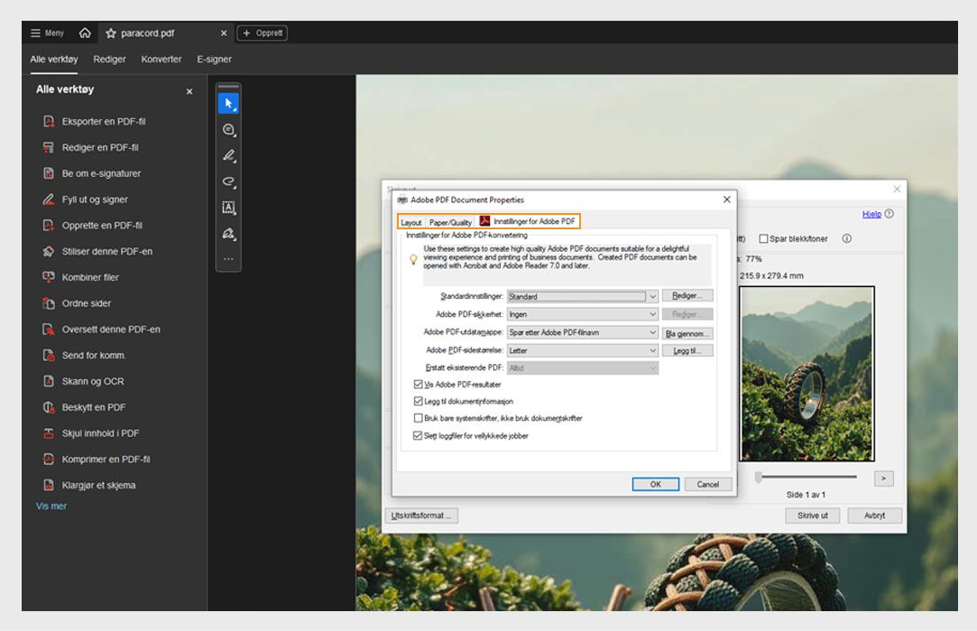 Fanen Adobe PDF-innstillinger i dialogboksen Utskriftsinnstillinger for Adobe PDF viser Standardinnstillinger, Adobe PDF-sikkerhet og alternativer for Adobe PDF-utdatamappe. 