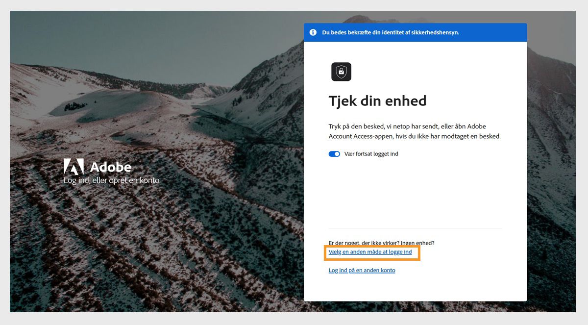 Adobe login-siden med vinduet Tjek din enhed, hvor Vælg en anden måde at logge ind på er fremhævet.